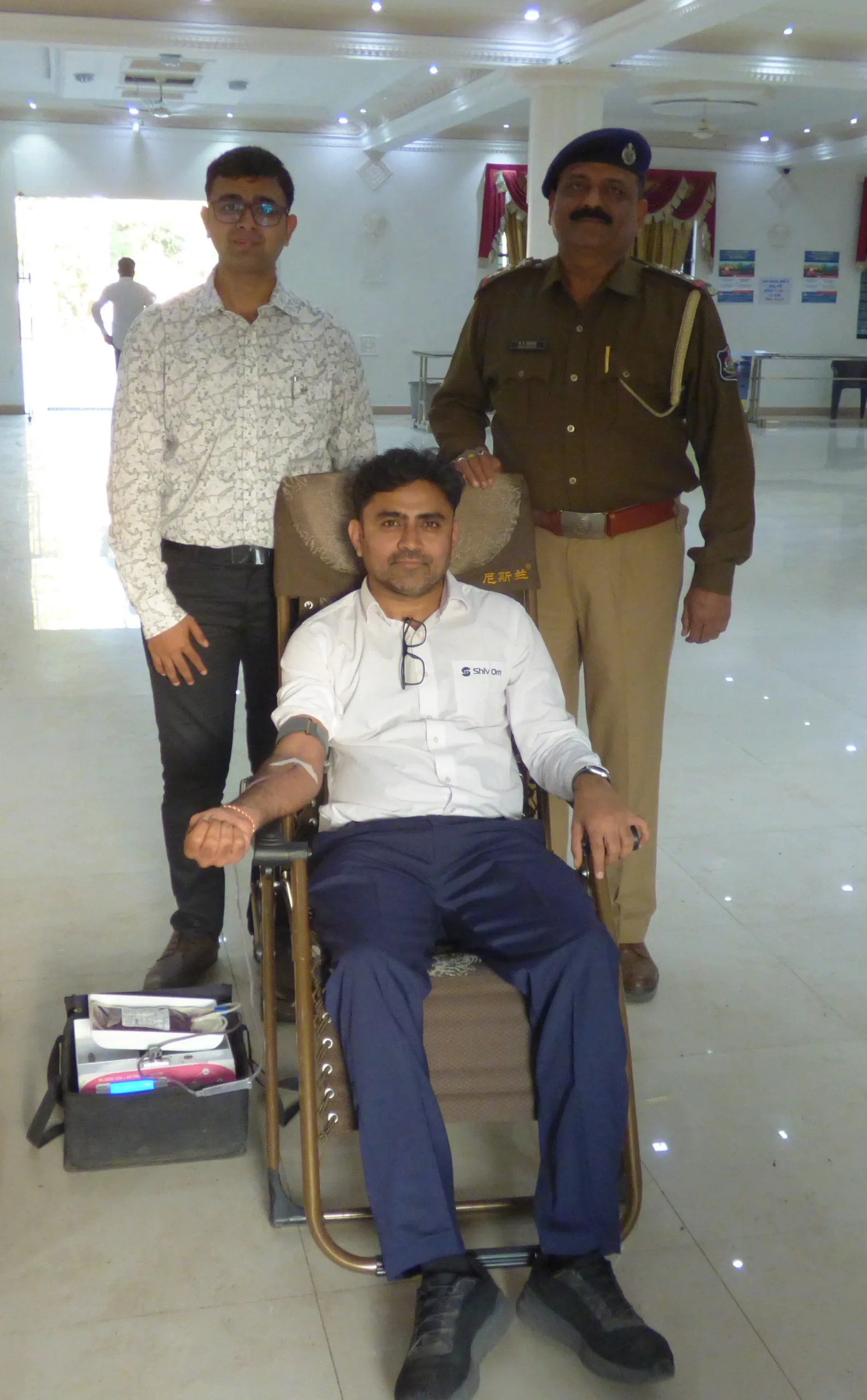 Blood Donation Participation Blood donation in progress during a community drive.